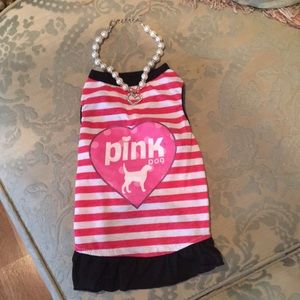 Dog dressed in matching necklace size Sm